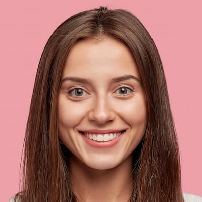 woman smiling happily into the camera